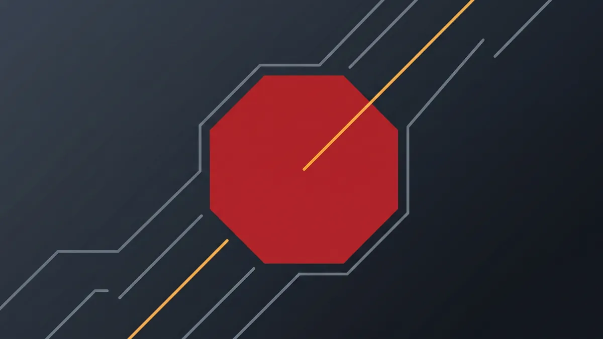 A red octagon with grey lines stopping short of its edge and one amber line continuing past it