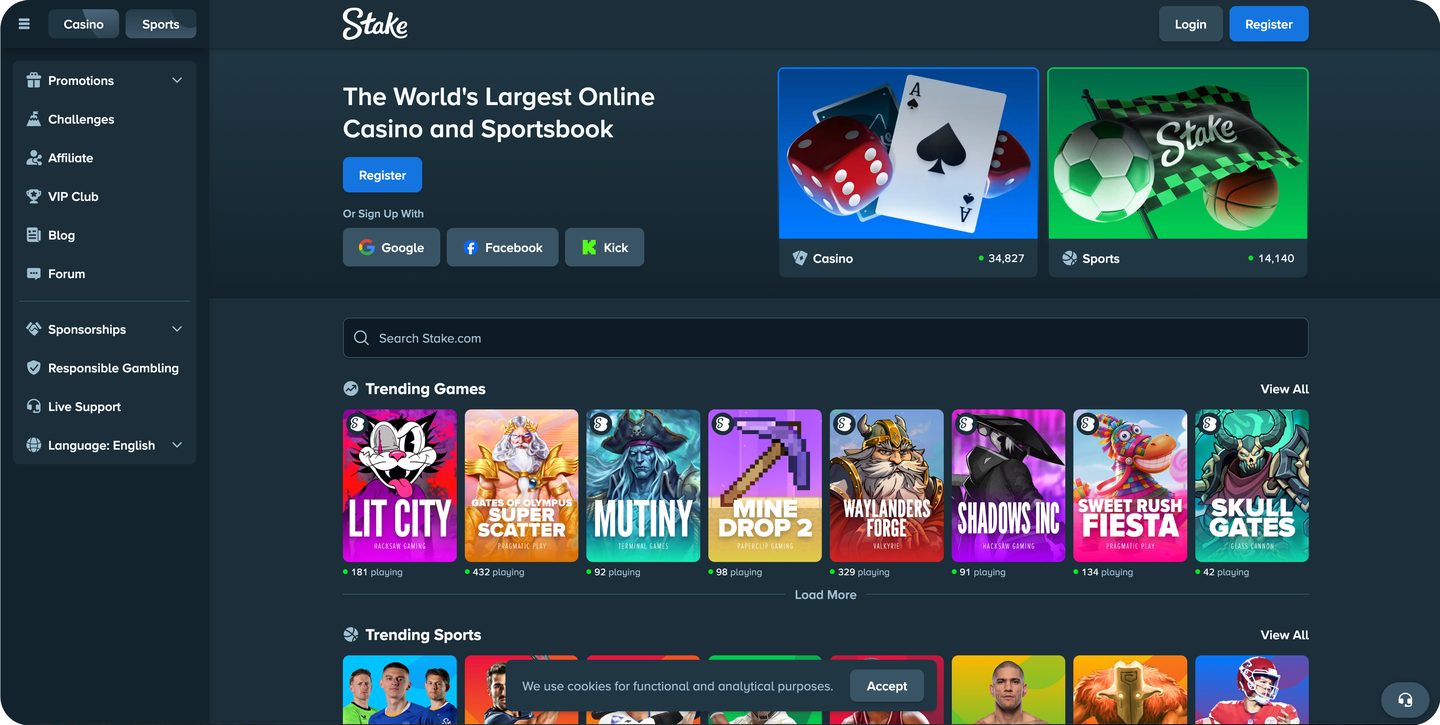 Stake lobby: casino and sportsbook entry cards with live player counts, the trending games grid and trending sports below